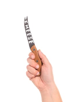 Hand holding cheese knife. Isolated on a white background.