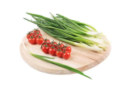 Vegetables on platter. Isolated on a white background.