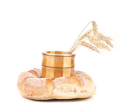 Healthy bread and wheat ears. Isolated on a white background.