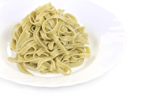 Cooked pasta tagliatelle. Isolated on a white background.