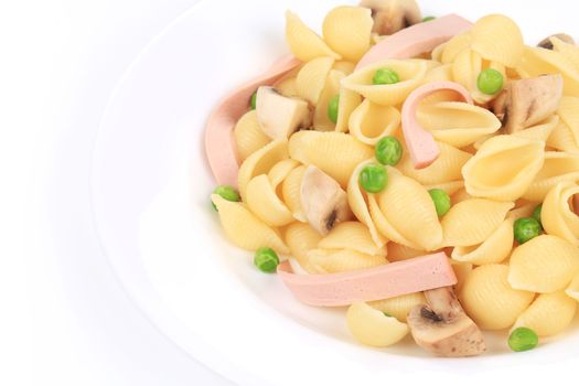 Italian pasta with ham and mushrooms. Isolated on a white background.