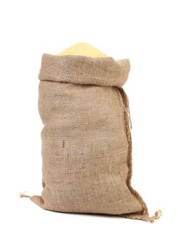 Canvas bag with cornmeal. Isolated on a white background.