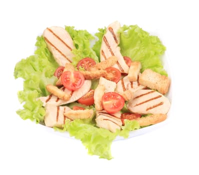Caesar salad with tomatoes cherry. Isolated on a white background.