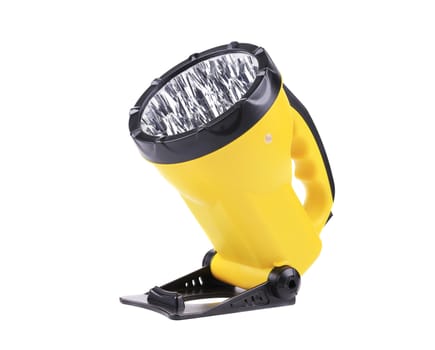 Yellow plastic pocket handle flashlight. Isolated on a white background.