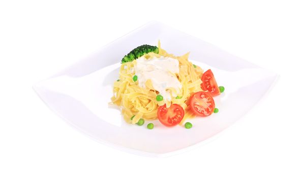 Pasta with dressing and green beans. Isolated on a white background.