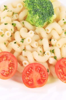 Pasta with broccoli and tomatoes. Whole background.