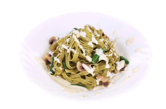 Pasta with mushrooms and sauce. Isolated on white background.
