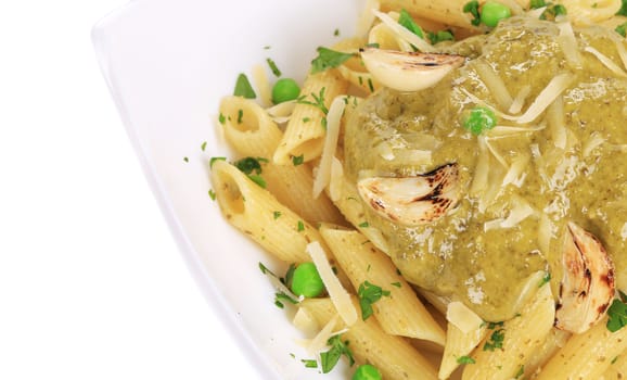 Pasta with pesto sauce. Close up. Whole background.