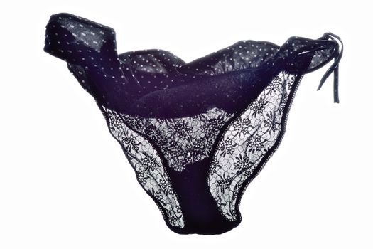 Black lace panties on white background