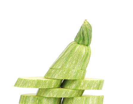 Fresh zucchini closeup. Isolated on a white background.
