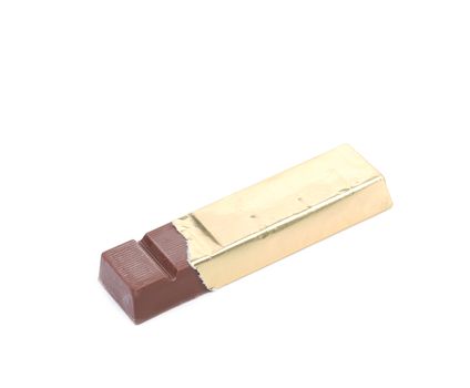 Dark chocolate bar in golden foil.