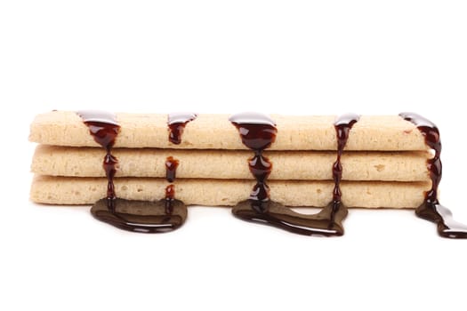 Coated cookies of chocolate. Isolated on a white background.