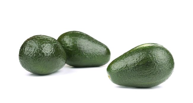 Three avocado. Isolated on a white background.