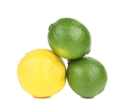 Two lime and one lemon. Isolated on a white background.