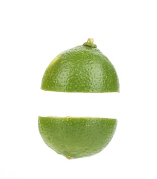 Lime cut in half. Isolated on a white background.