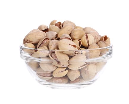 Bowl with pistachios. Isolated on a white background.