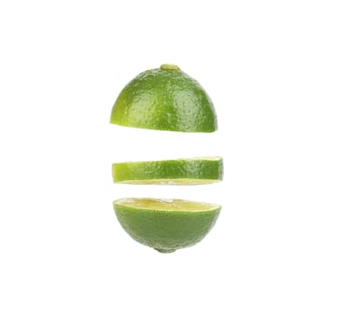 Cut lime. Isolated on a white background.
