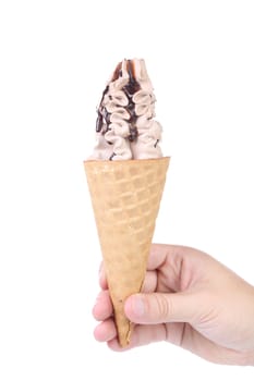 Hand holds ice cream. Isolated on a white background.