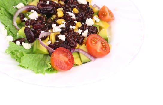 Red beans salad with feta cheese. Isolated on a white background.