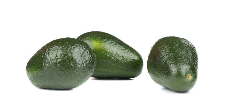 Three avocados. Isolated on a white background.