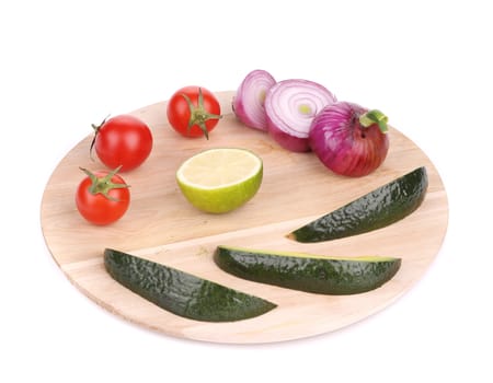 Fresh vegetables on platter. Isolated on a white background.