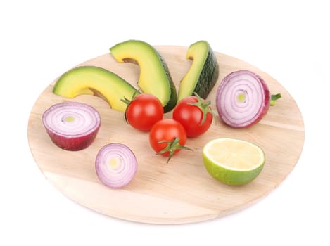 Fresh vegetables on platter. Isolated on a white background.