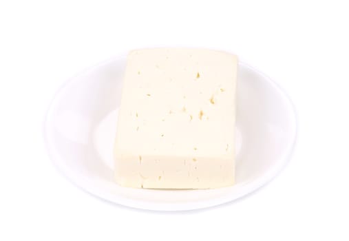 Delicious feta cheese. Isolated on a white background.