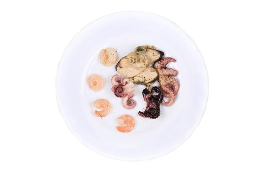 Tasty seafood on the round plate. Isolated on a white background.