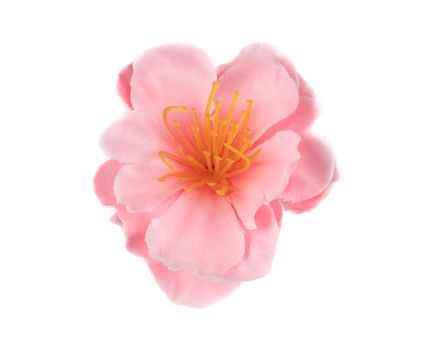 Pink beautiful artificial flower. Isolated on a white background.