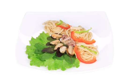 Seafood salad with spaghetti. Isolated on a white background.