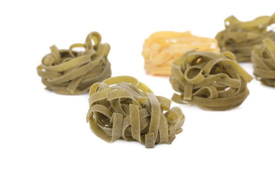 Tagliatelle italian pasta. Isolated on a white background.