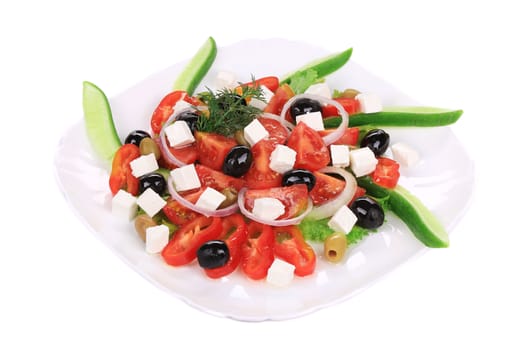 Greek salad. Isolated on a white background.