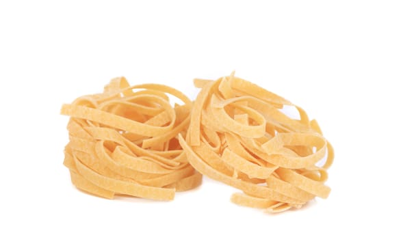 Tagliatelle italian pasta. Isolated on a white background.