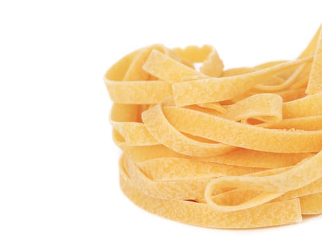Tagliatelle italian pasta. Isolated on a white background.