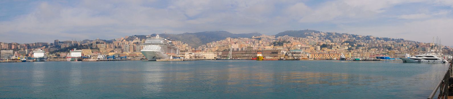 Wide panoramic view of the city of Genoa skyline from the sea