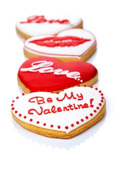 Valentine love cookies in shape of heart on white background for Valentine's Day