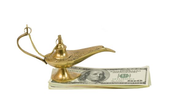 Bundle of dollars and magic lamp of Aladdin. Isolated on white background