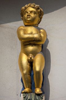 The Golden Boy of Pye Corner in the City of London.  The statue marks the location where the Great Fire of London was stopped in 1666.