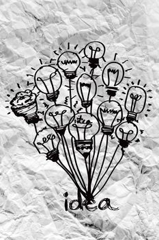 idea concept light bulb on crumpled paper