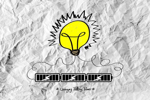 Light bulb Charging Battery Power Idea design on crumpled paper