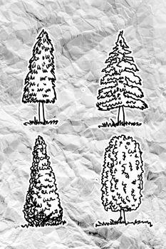 Set of trees with leaves on crumpled paper