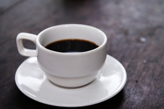 White Coffee Cup on a Wooden Table 
