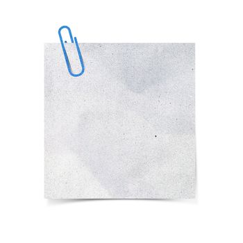 Paper clip and paper on white background