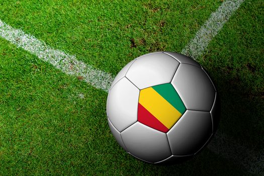 Guinea Flag Pattern of a soccer ball in green grass