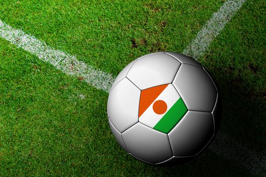 Niger Flag Pattern of a soccer ball in green grass