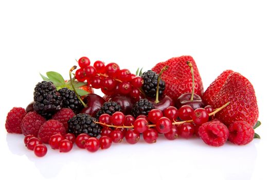 pile of red summer fruits or berries