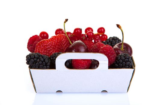 punnet of fresh red summer fruits