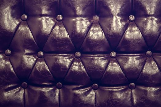 Vintage leather texture of sofa closeup shot