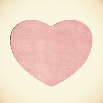 Vintage heart recycled paper on white background