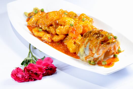 Chinese Food:Sweet and Sour Perch on a white plate